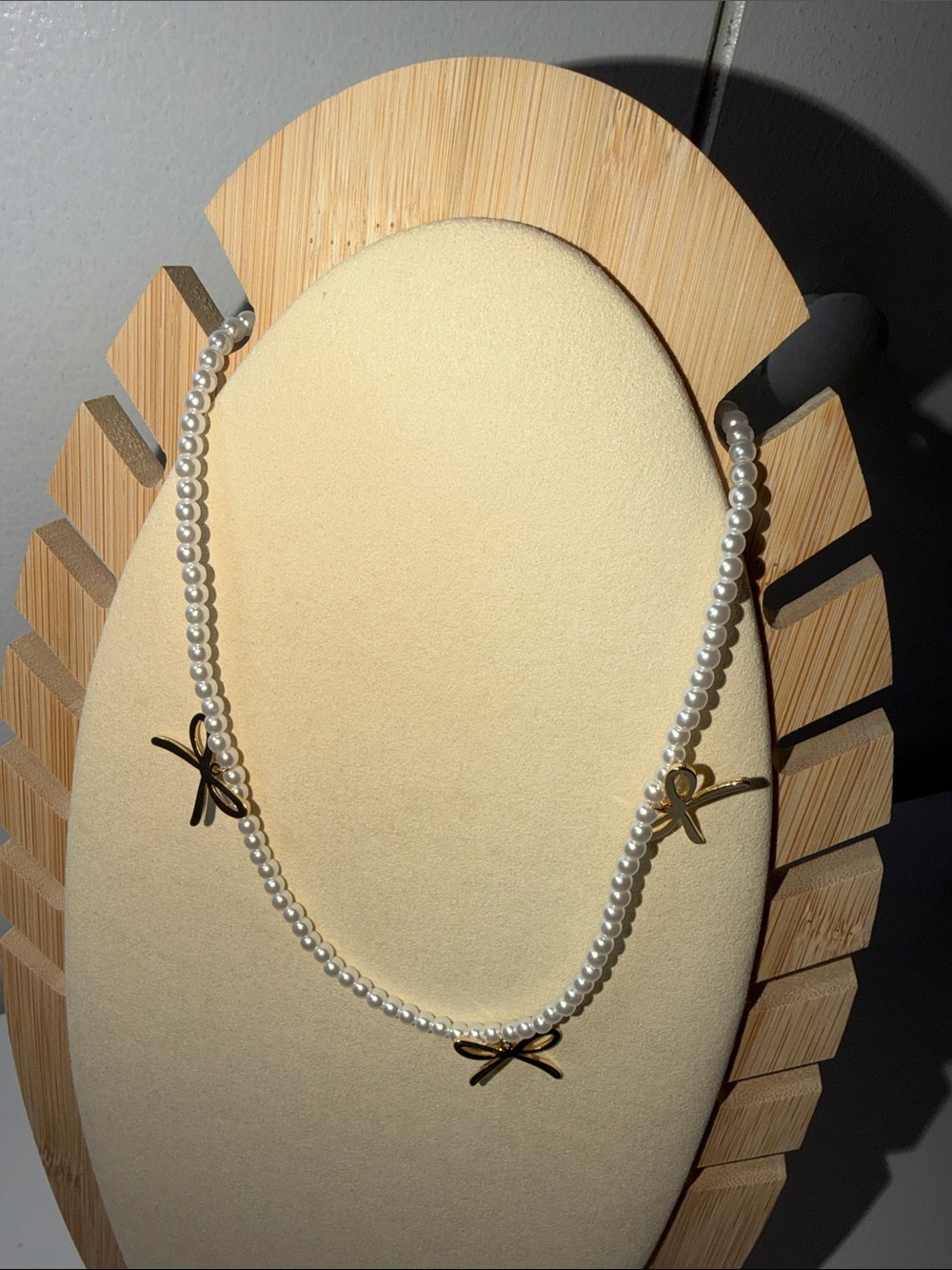 Pearl Beaded Necklace with Gold Bow Accents - White